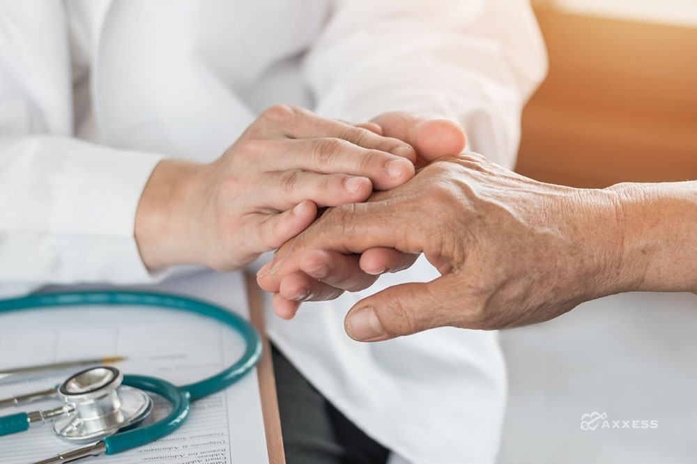 A doctor comforting a patient