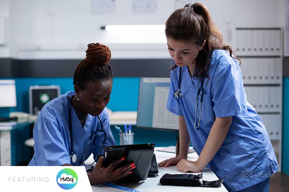 Considering the options, the second one strikes a good balance. Image of two nurses, one African-American and one Caucasian, in blue scrubs reviewing information on a tablet in a hospital or clinic setting. A “New” banner is in the corner and the image is labeled “Featuring nVoq.”