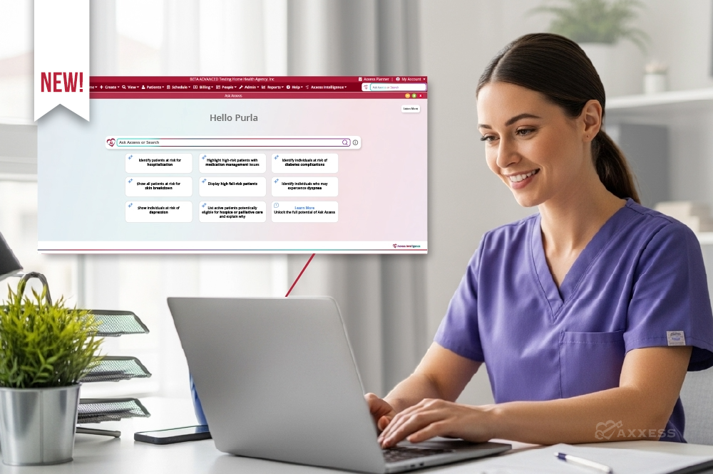 A healthcare professional in purple scrubs sits at a desk using a laptop displaying the Ask Axxess interface. The screen shows a search bar labeled &ldquo;Ask Axxess or Search&rdquo; and several options for identifying high‑risk patients, including risks for hospitalization, medication issues, diabetes complications, falls, depression, and hospice eligibility. A small plant, notebook, and file organizer are on the desk.